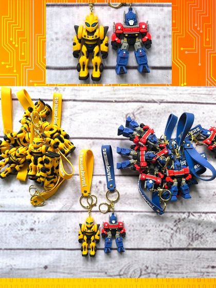 A collection of high-quality silicone keychains featuring Transformers characters like Bumblebee and Optimus Prime.