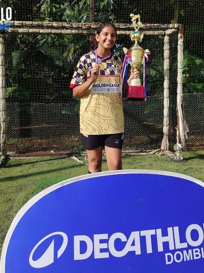 Nidhika, our top scorer, proudly holding her medal and the championship trophy from the Sparta X Decathlon League. A shining example of the talent in our girls' program.