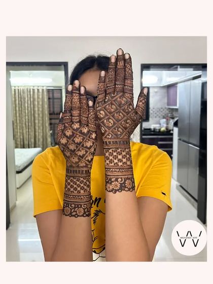 A stunning back-hand design with a full grid of baby elephants.