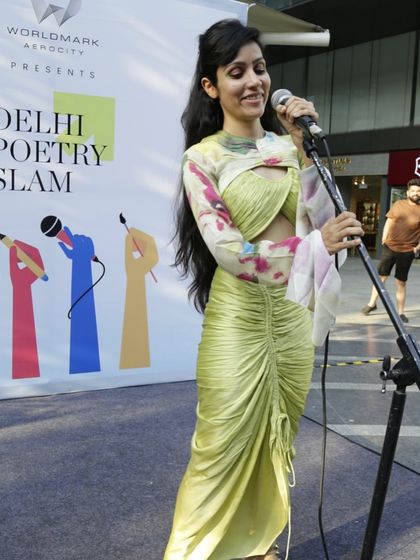 A poet known for her healing and empowering words on stage at Worldmark. Our showcases aim to inspire and uplift the audience.