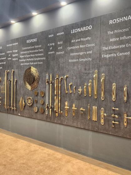 This display wall at IndiaWood Bangalore 2024 showcases several of my collections, from the regal Roshanara to the modern Leonardo. Each collection is presented with a brief description of its design inspiration, telling the story behind the brass.