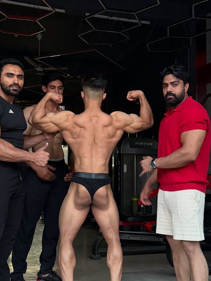 Back pose check. We've worked hard to build impressive back muscles.