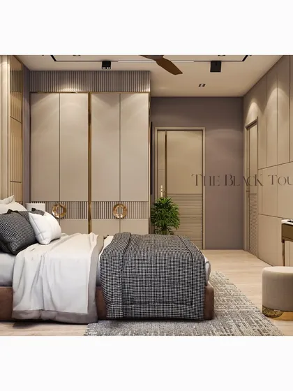 A different perspective of the luxurious bedroom concept. This view showcases the seamless integration of the wardrobe, door, and wall paneling, all tied together with elegant gold trim.