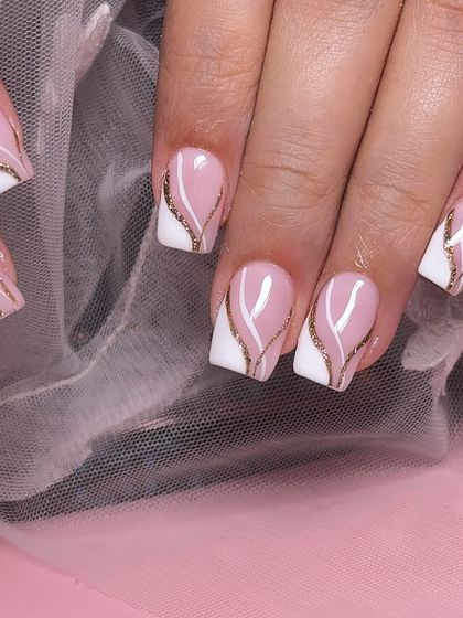 A closer look at the beautiful gold glitter swirl detail on this modern French set.