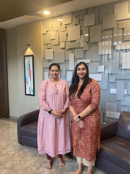 A photo of Yogmaya with Mrs. Ashwini Puneet Rajkumar. Building relationships based on mutual respect is a cornerstone of our professional life.