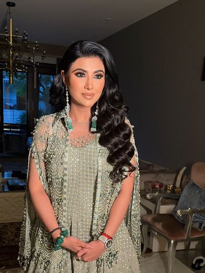 Another portrait of the client, her classic waves looking timeless and chic.