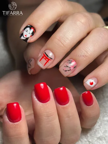 A tribute to Japanese artistry, entirely hand-painted. This set on natural nails combines vibrant red with accent nails featuring a Geisha portrait, a Torii gate, and delicate cherry blossoms.