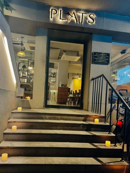 Happy Diwali from the Plats team! Our entrance is lit with candles, ready to welcome you for a celebration.