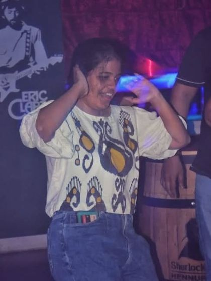 A guest lost in the music on the dance floor. It's a place to escape and just feel the rhythm.