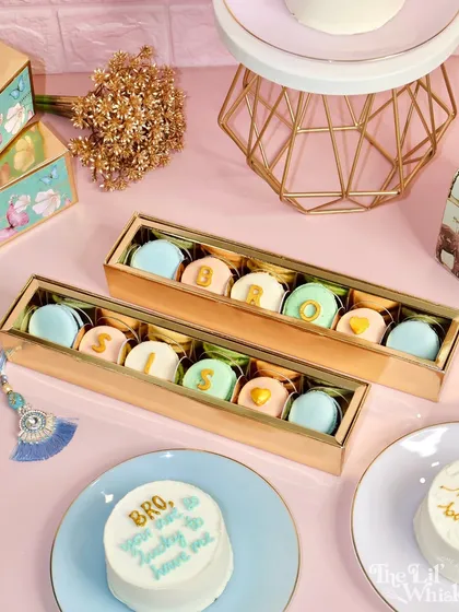 Our Rakhi collection, featuring curated gift boxes with macarons and personalized bento cakes for both your brother and sister.