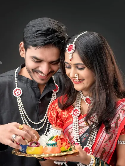A candid moment between a couple as they share a platter of tilgul. These interactive shots create natural and loving memories.