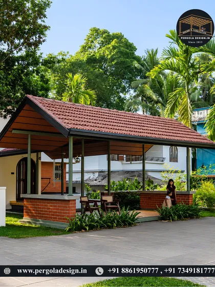 This versatile structure serves as both a carport and a covered patio. The A-frame roof with Mangalore tiles offers excellent protection and a traditional aesthetic, while the brick base and open sides create a welcoming space for both parking and relaxation.