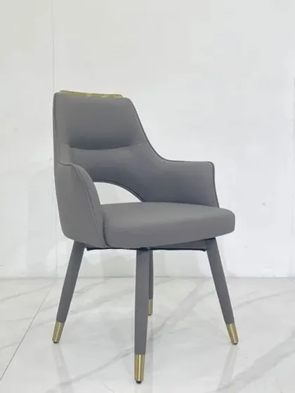 The same dining chair design is also available in a sleek grey color, offering a more understated and contemporary look.