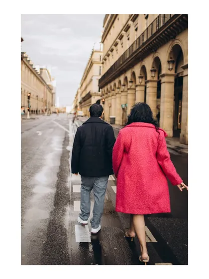 A candid moment walking through the wet streets of Paris. I focus on capturing the in-between moments that feel authentic and tell a story of your journey together.