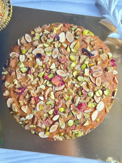 My Kalakand Tea Cake is a festive fusion of tradition and modern baking. It’s a rich, moist tea cake infused with the nostalgic flavors of kalakand and topped with nuts.
