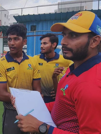 Head Coach Prateek Jain strategizing with the senior team. His experience as a Ranji player provides invaluable insights into match preparation and tactics.