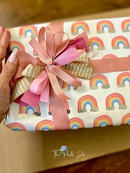The final touch is where the story is sealed. I believe thoughtful wrapping is an art form, from the carefully chosen paper to the multi-layered ribbon bow, each element is tied with care and intention.