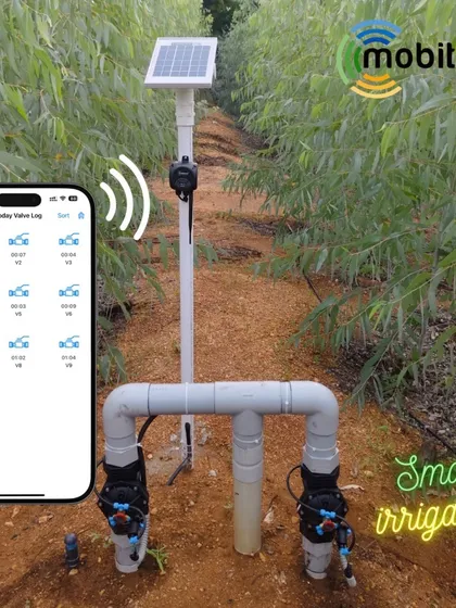 A solar-powered smart irrigation setup showing the valve log on the mobile app, giving farmers a complete history of their watering schedule.