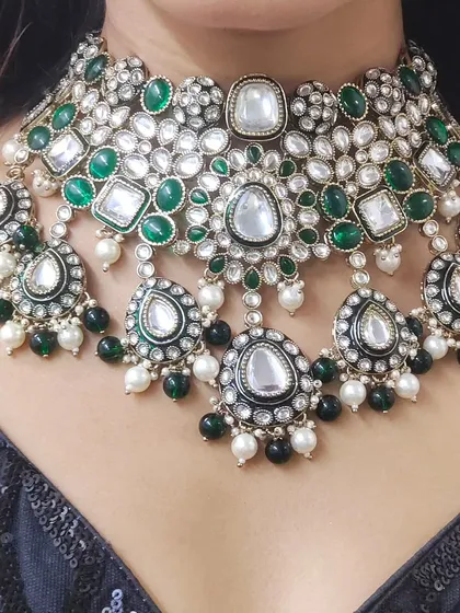 Just look at the detail. This is a close-up of one of my reverse American Diamond sets with green stones and pearl drops. I focus on providing high-quality craftsmanship so you get the designer look and feel.