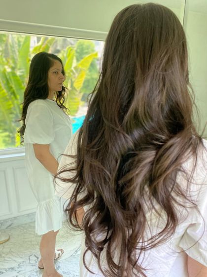 Say hello to summer vibes with a fabulous long layered haircut, perfect for that breezy, effortless look.