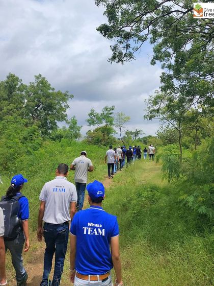 A group of volunteers from Honeywell exploring the trails at our Prayagdham site in Pune. Our corporate outings always include a nature walk, allowing teams to connect with the environment they are helping to restore.