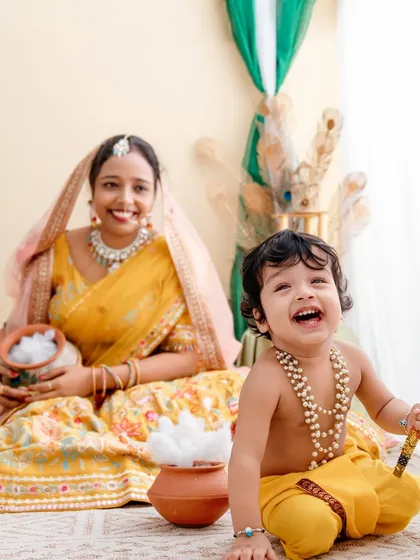 The pure joy of a festive photoshoot! Here, we celebrated Janmashtami with a playful Krishna theme. The laughter from this little one as he holds his flute is what makes these sessions so special.