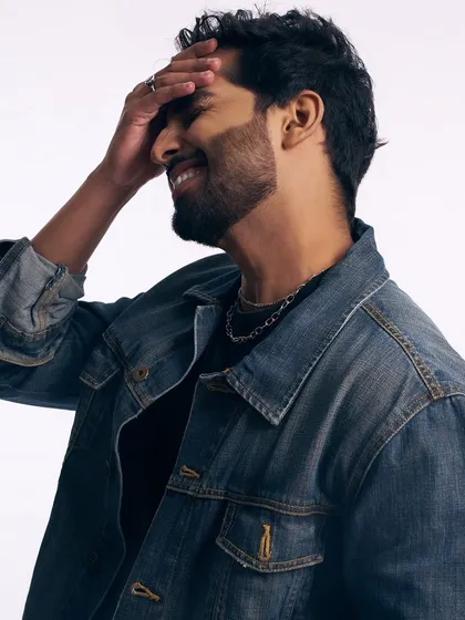A candid, happy moment. The grooming is designed to look like his best self, effortlessly.