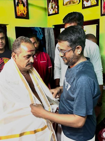 Our Guru, Shri Kalavadhyam Dheeraj Edat, honors visiting maestro Shri Peruvanam Sankaranarayanan Marar during our Guruvandanam ceremony.