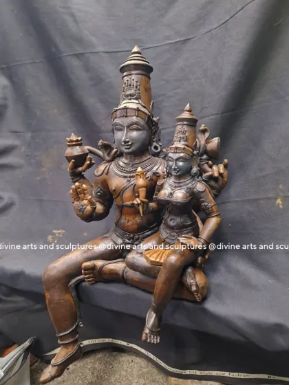 A wax model of Swarnakarshana Bhairava, a form of Lord Shiva who attracts prosperity. The detail of the deity with his consort on his lap is fully realized in wax first.
