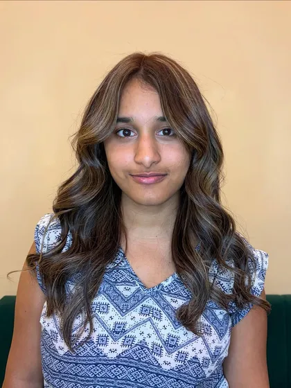 This cool ash blonde is effortless and elevated. The color is placed to move with the hair, creating a dynamic and modern look.