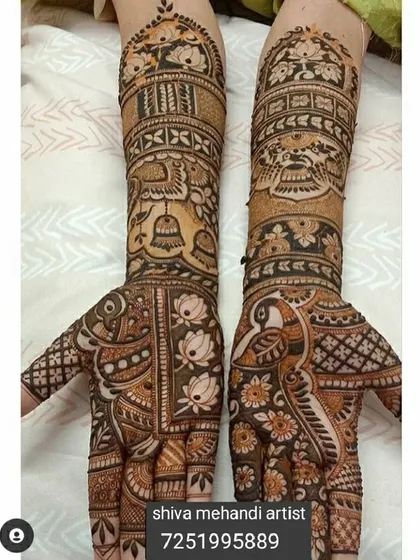 A design rich in symbolism, featuring a cow and bell, a peacock, and lotus flowers, all classic elements of Indian art.