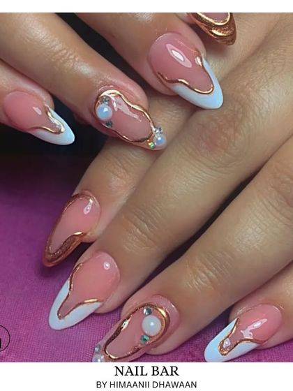 An abstract design using a 3D gold outline over a pink and white base, accented with pearls for a touch of elegance.