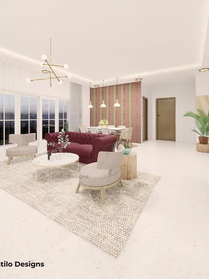 This living room is designed for a bright and airy feel, with a pop of color from the maroon sofa. I used a large area rug to define the seating space and modern, minimalist furniture to create an atmosphere of understated luxury.