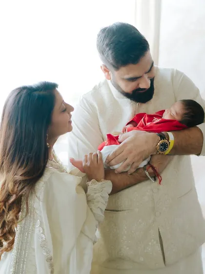 New parents gazing at their perfect creation. These are the moments that define the beginning of your family's story.