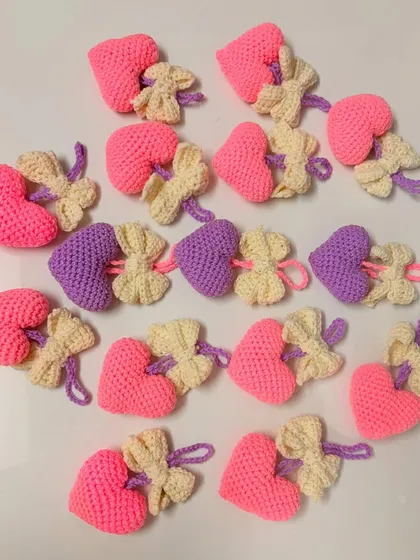 These heart and bow bag hangings are perfect as party favors or small gifts. I can create them in various colors for bulk orders.