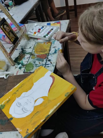 Follow along as a young student works diligently on her portrait painting, from the first outline to the final expressive details.