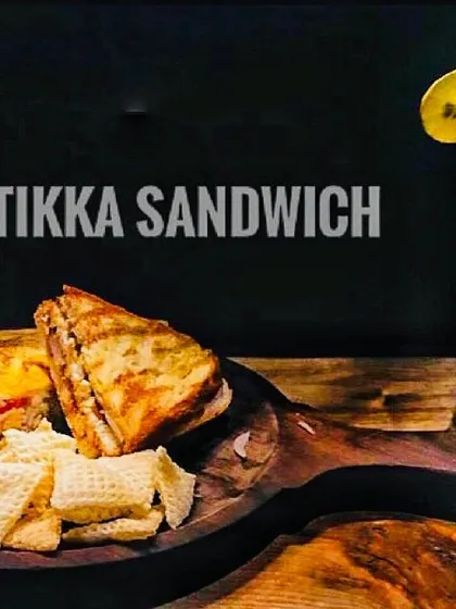 My Chicken Tikka Sandwich is a full meal in itself. It's packed with flavorful chicken tikka, grilled to perfection, and served with a side of munchies. It’s one of our most ordered comfort food dishes.
