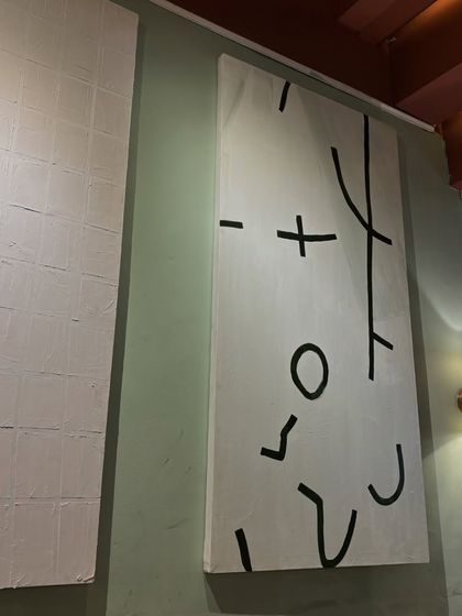 Another of the large black and white canvases for Sidewalk cafe. This one features a playful, scattered composition of abstract symbols and lines.