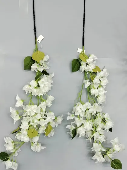 Delicate trailing artificial bougainvillea stems in white, ideal for adding to wedding decor or hanging arrangements.