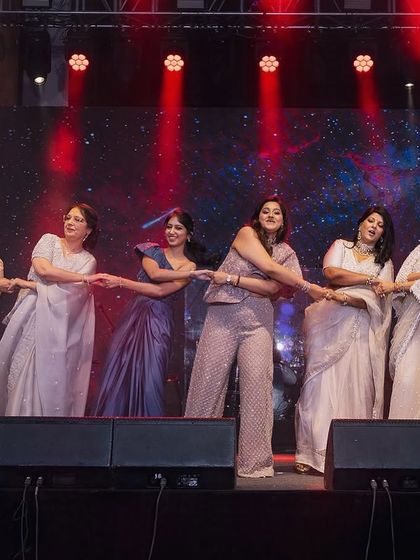 A fun, connected move that brings the whole group together during the welcome dance.