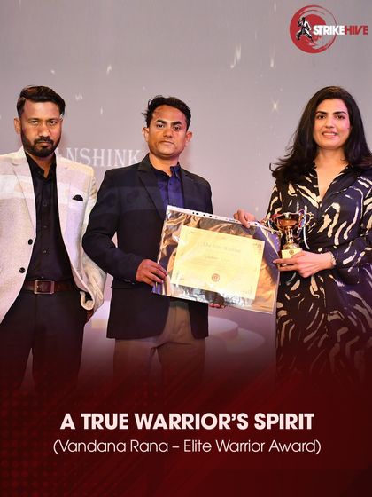 A student receives the "Elite Warrior Award," a recognition of her true warrior spirit.