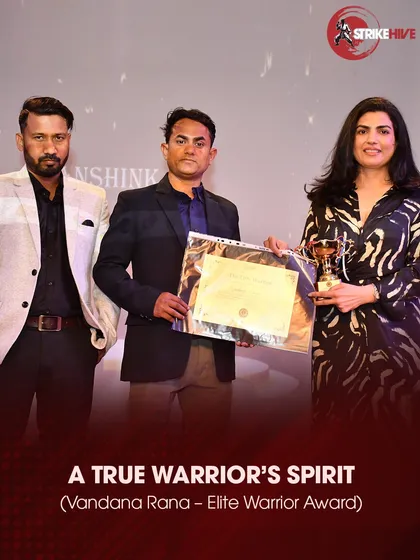 A student receives the "Elite Warrior Award," a recognition of her true warrior spirit.