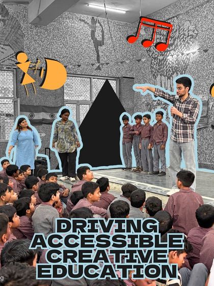 "Driving Accessible Creative Education." Our fellows engage with students on stage during a school assembly, making learning a dynamic and public celebration.