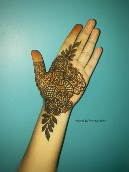 The design in an earlier stage, showing just the palm work.
