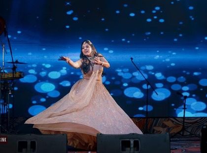 A beautiful solo performance by the bride. Her twirl and grace are absolutely captivating.