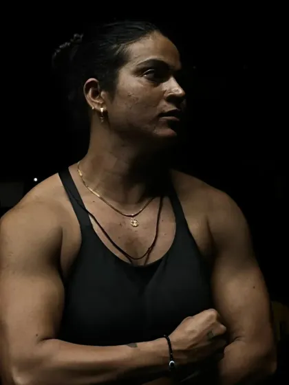 A more artistic shot showing the muscle and definition built from powerlifting.