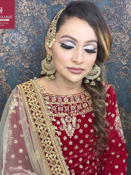 The complete Muslim bridal look with eyes closed, highlighting the beautiful cut-crease eyeshadow and blending work.