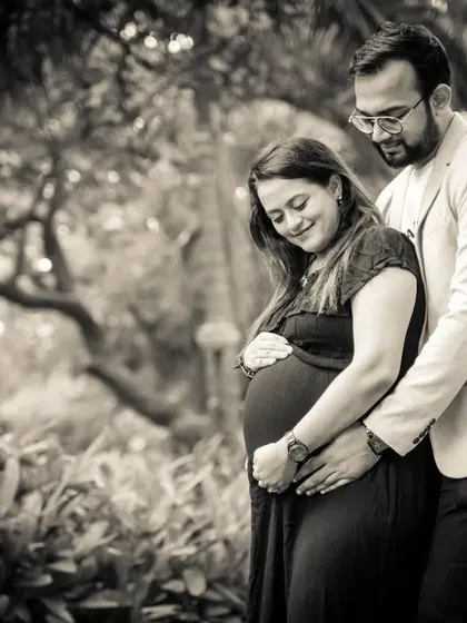 A beautiful black and white portrait that emphasizes the couple's connection and the texture of the natural surroundings.