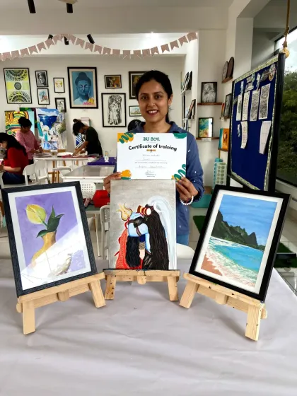 This student's final acrylic paintings include a beautiful beach scene and a depiction of Shiva, showing her creative range.