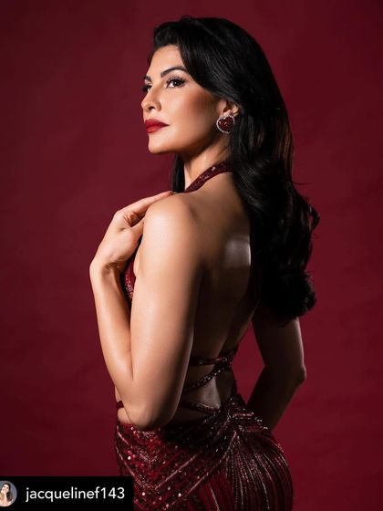 A profile shot showcasing the flawless makeup and hair for Jacqueline's Filmfare look. The balance between the bold lip and classic hair is perfect.